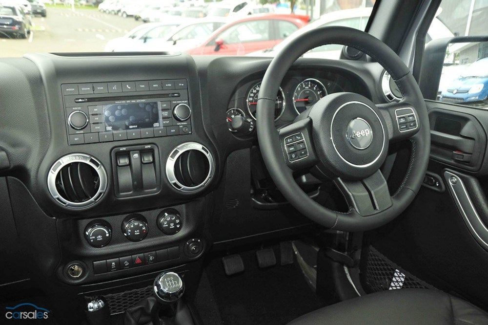 What is the blank button next to Hazard on JK? | Jeep Enthusiast Forums